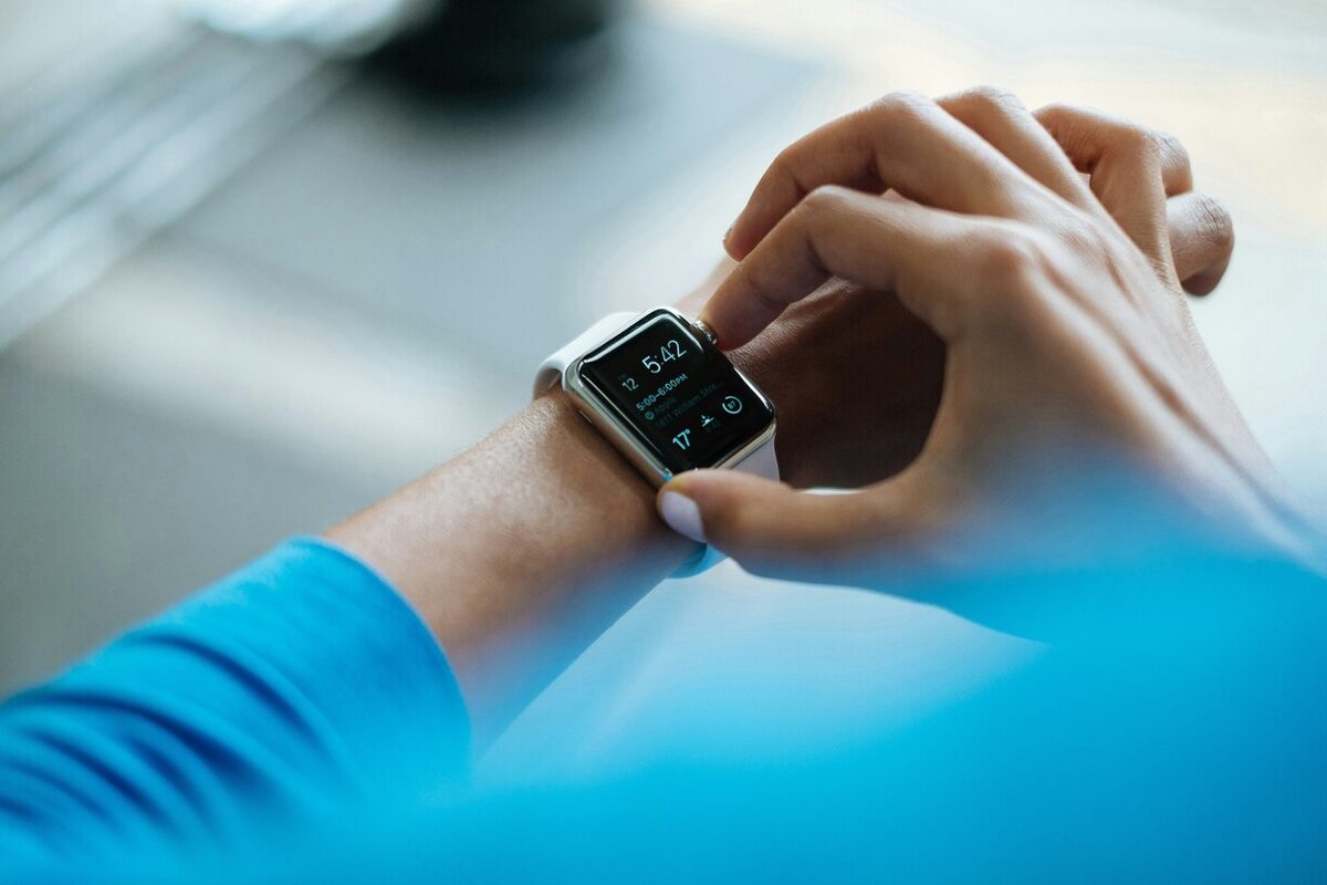 Person checking a smartwatch