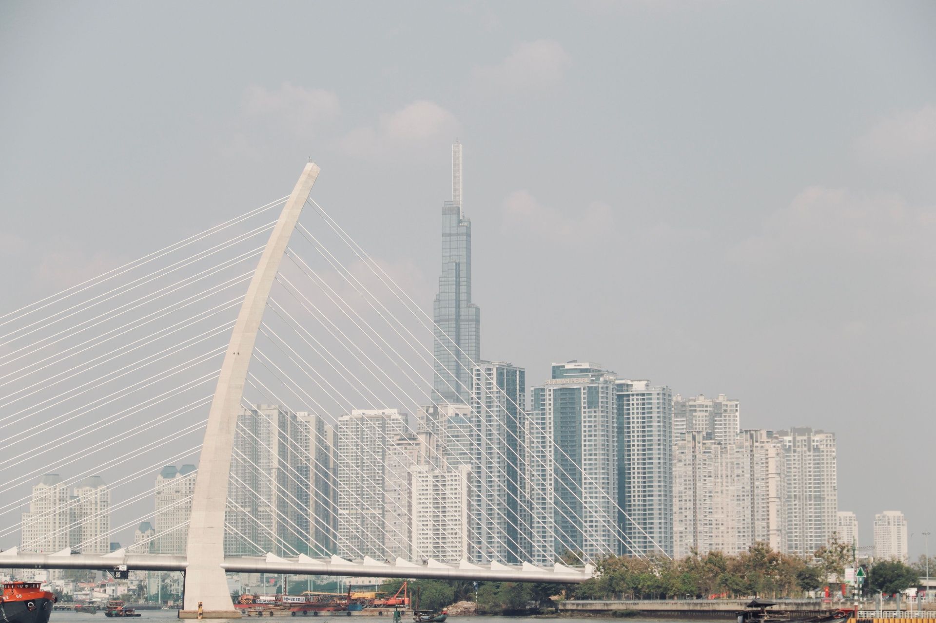 Ho Chi Minh City skyline with Ba Son Bridge and Landmark 81 tower