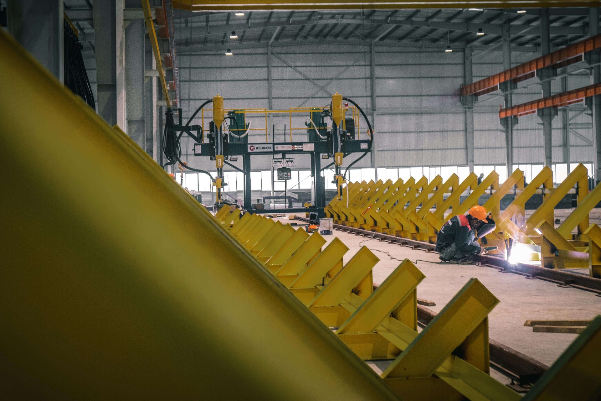 Logistics operations with forklifts moving pallets inside a warehouse