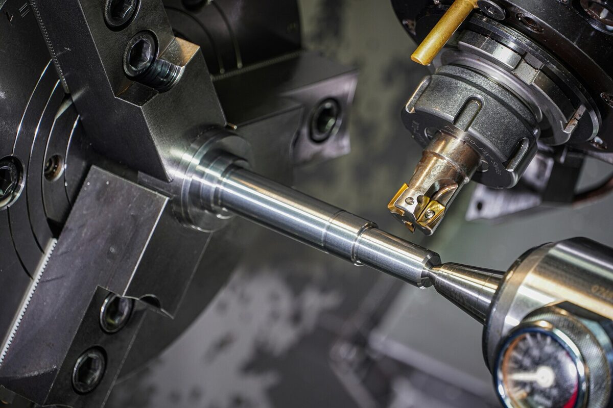 Precision metal part being machined on a CNC machine